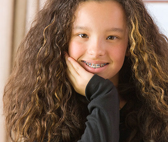 A girl with curly hair.