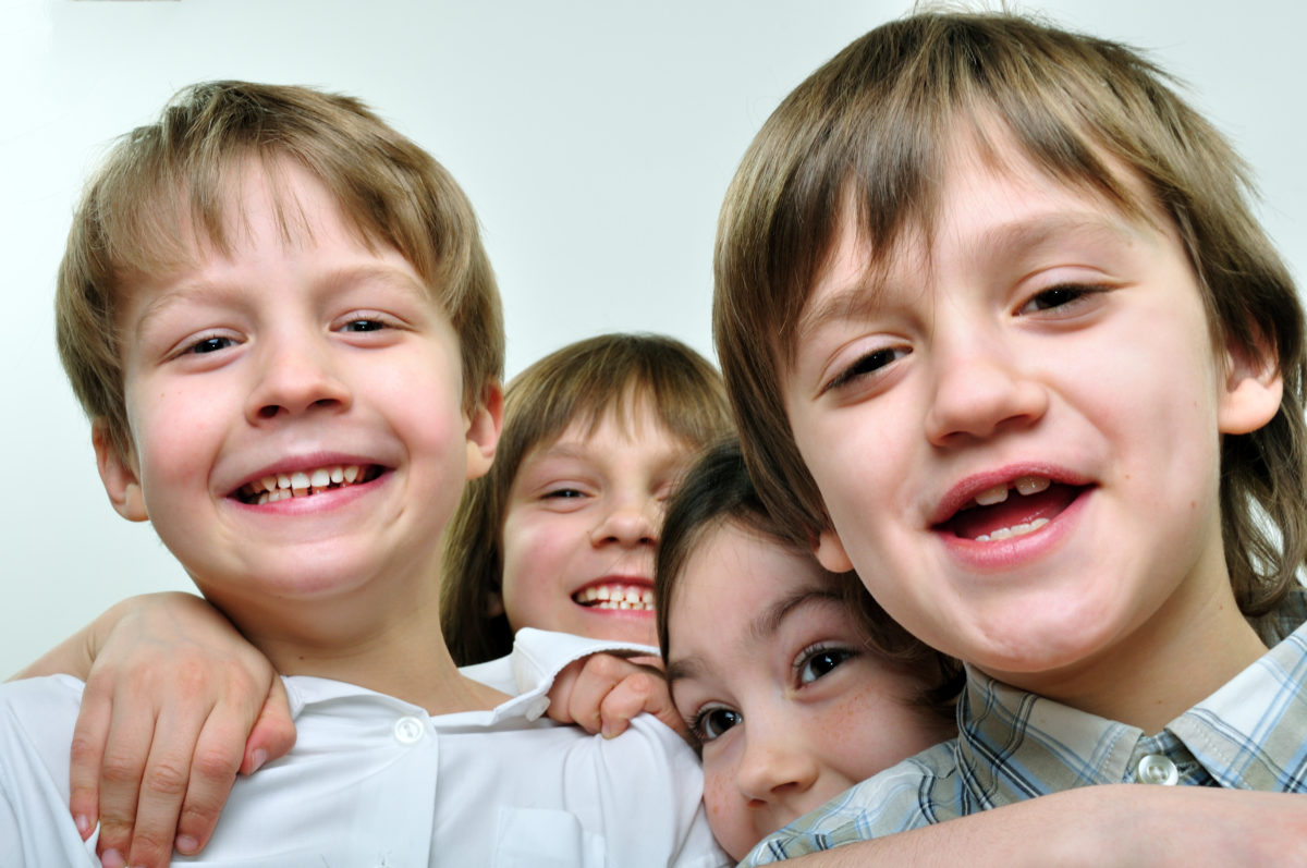 A group of children posing for a picture.